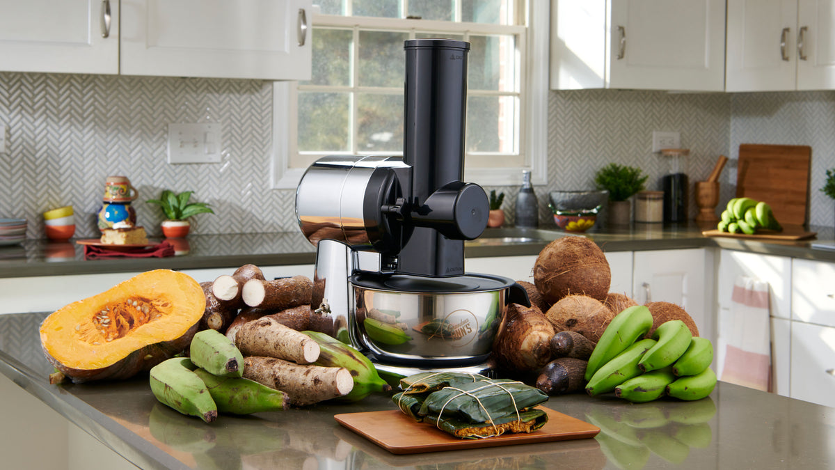 Grandma Ann’s Electric Grater machine for pasteles with green bananas, yuca, yautía, calabaza, coconut, and finished Puerto Rican pasteles