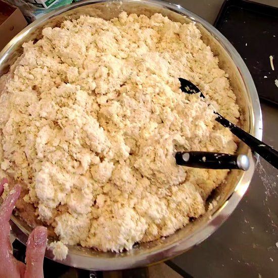 Fresh grated masa for Puerto Rican pasteles made with Grandma Ann's Electric Grater