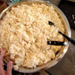 Fresh grated masa for Puerto Rican pasteles made with Grandma Ann's Electric Grater